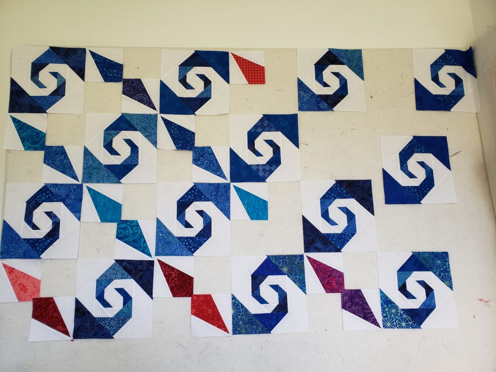 Handmade multi-color Storm At Sea quilt, vibrant cotton fabrics