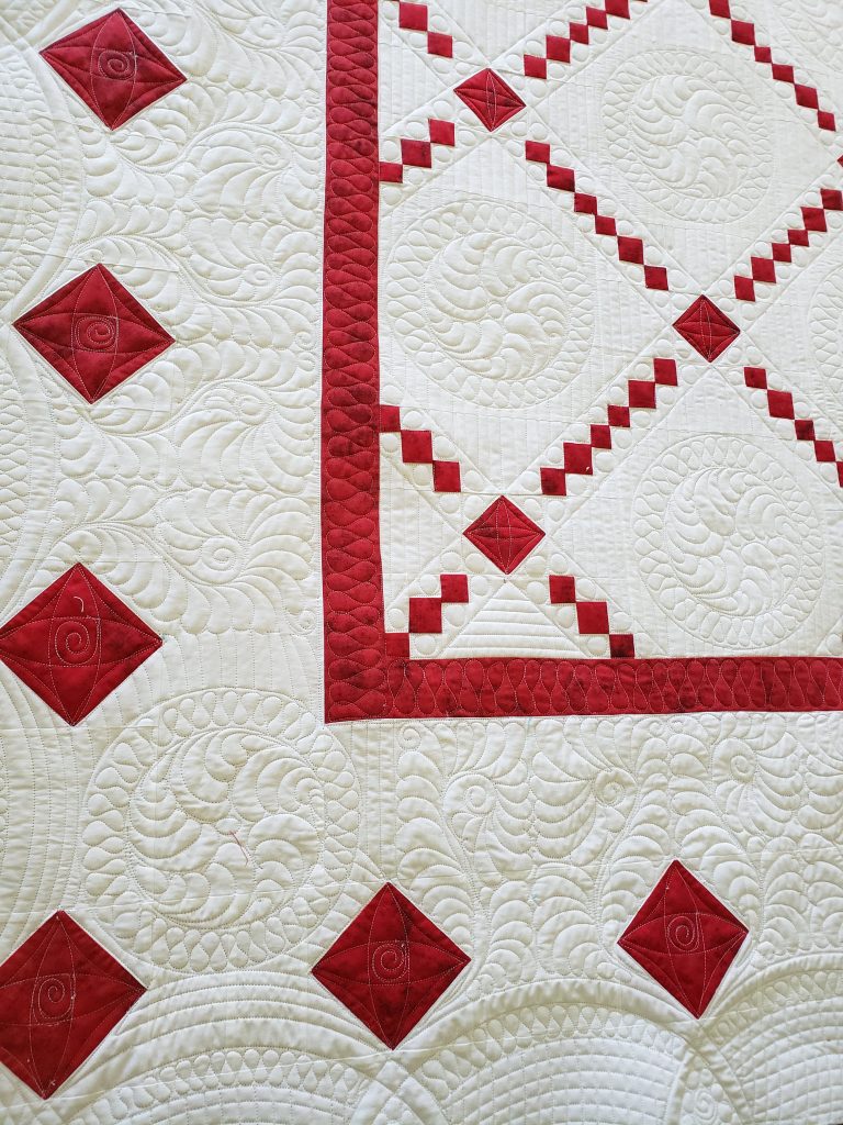 quilts for sale/ Custom made Whole Cloth Quilt quilt with vibrant red and white color scheme