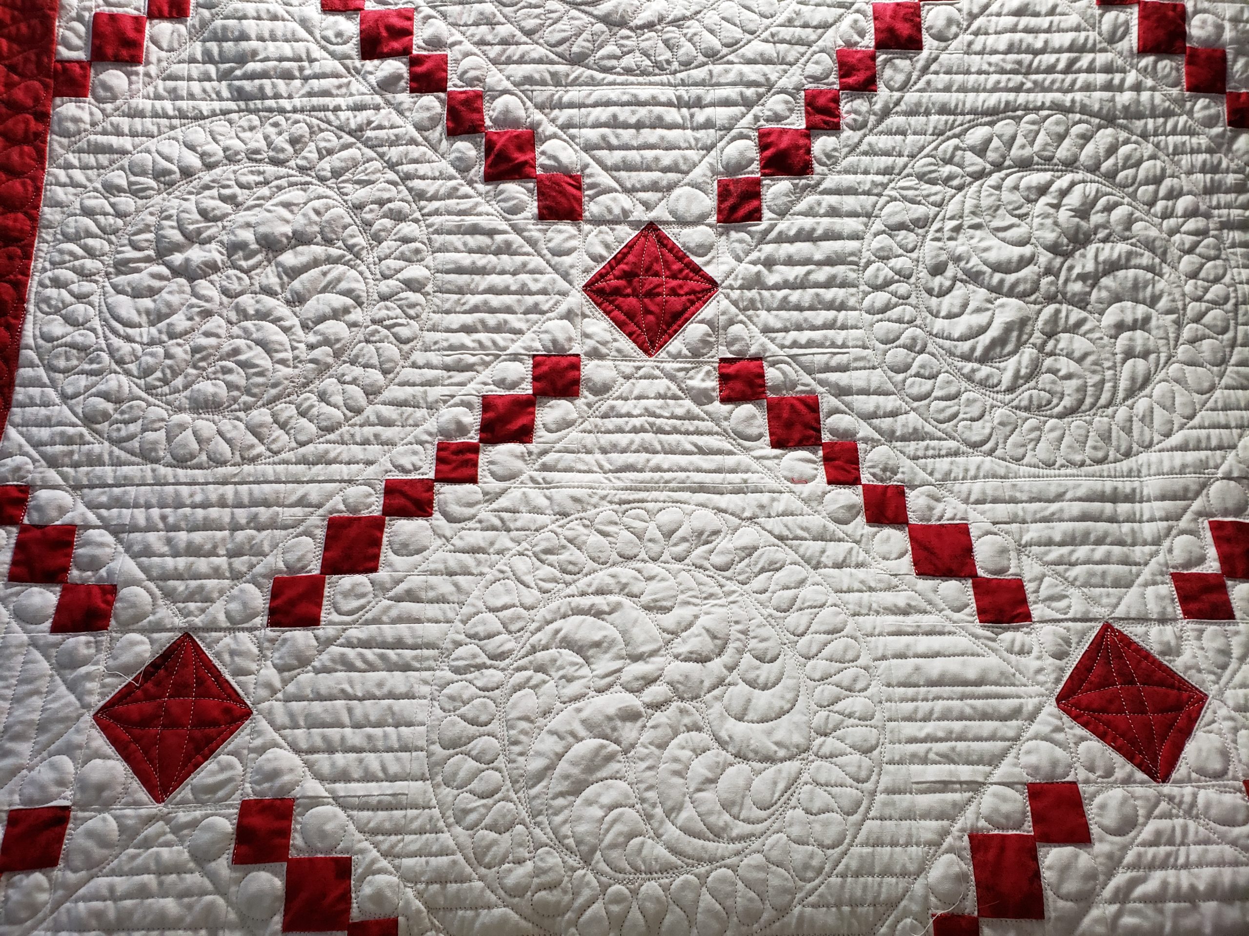 Quilts for Sale/ Close-up of 100% cotton fabric used in Storm at Sea quilt design