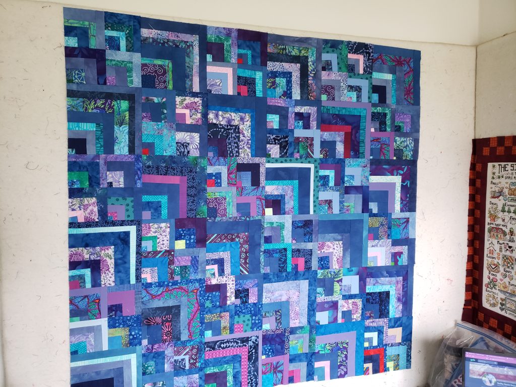 Log Cabin Quilt in blues, on point half log cabin