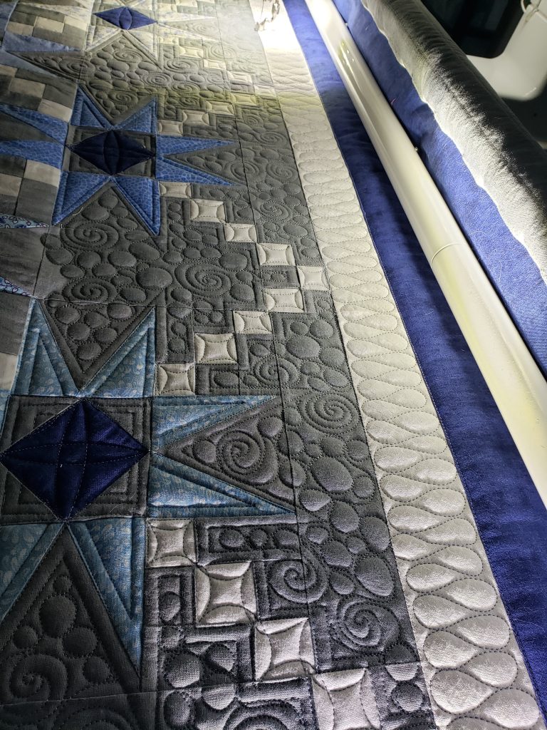 Handmade Quilts/Custom made Hunter’s Star quilt with layered blue tones