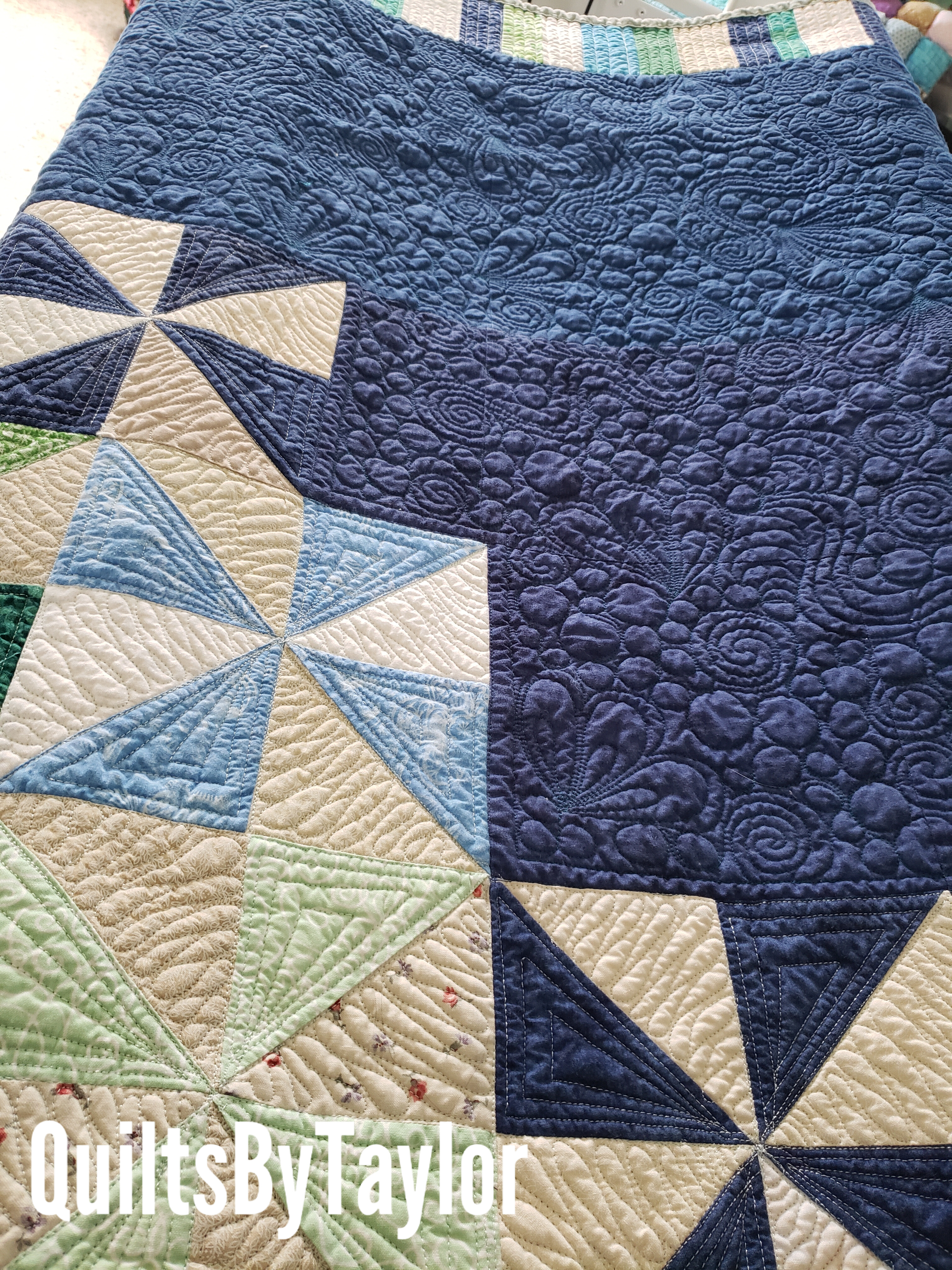 Quilts For Sale quilts for sale/ Custom Pinwheel Quilt in King size displayed on bed, handmade by Quilts by Taylor