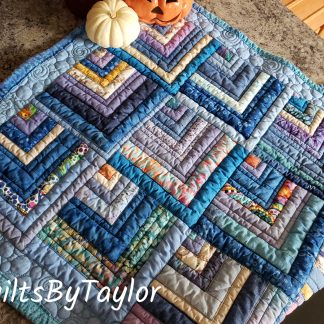 handmade quilted table rug, log cabin mini quilt, eco-friendly handmade quilt, rustic home décor, sustainable quilted accent