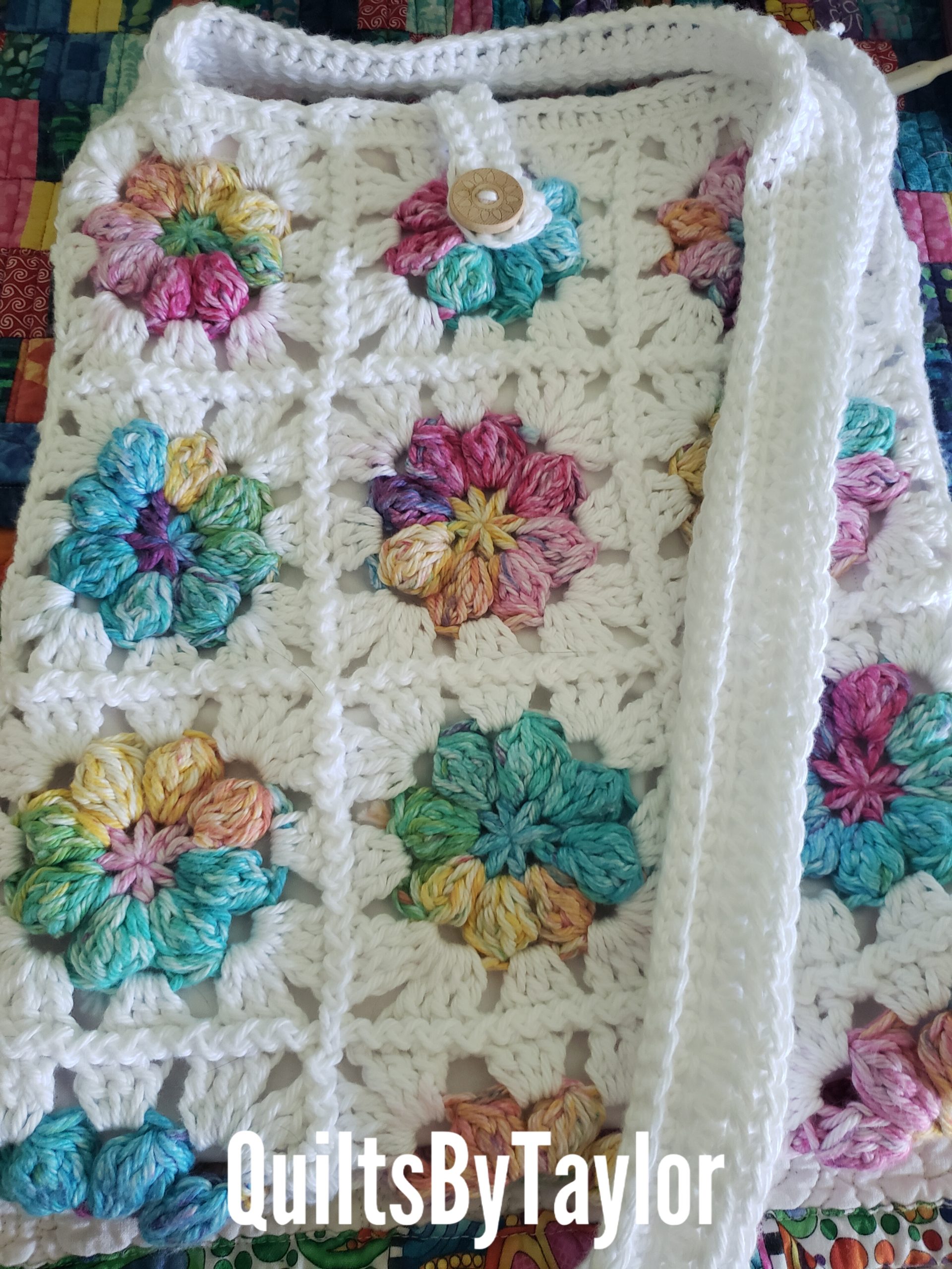 Quilts For Sale/ Quilt for Sale/ Quilt for Sale Handmade Handmade cotton crochet handbag with colorful flower motifs, fabric lining, button closure, and long crossbody strap. Ready to ship.